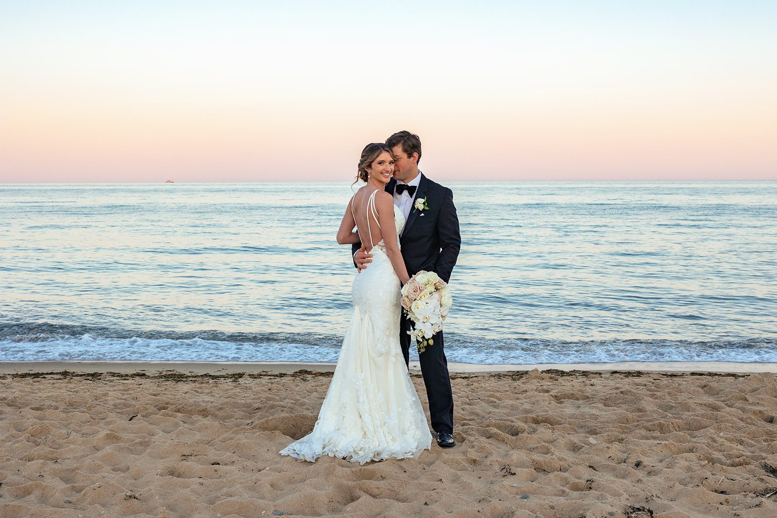 A Popponesset Inn Wedding with cotton candy sunset
